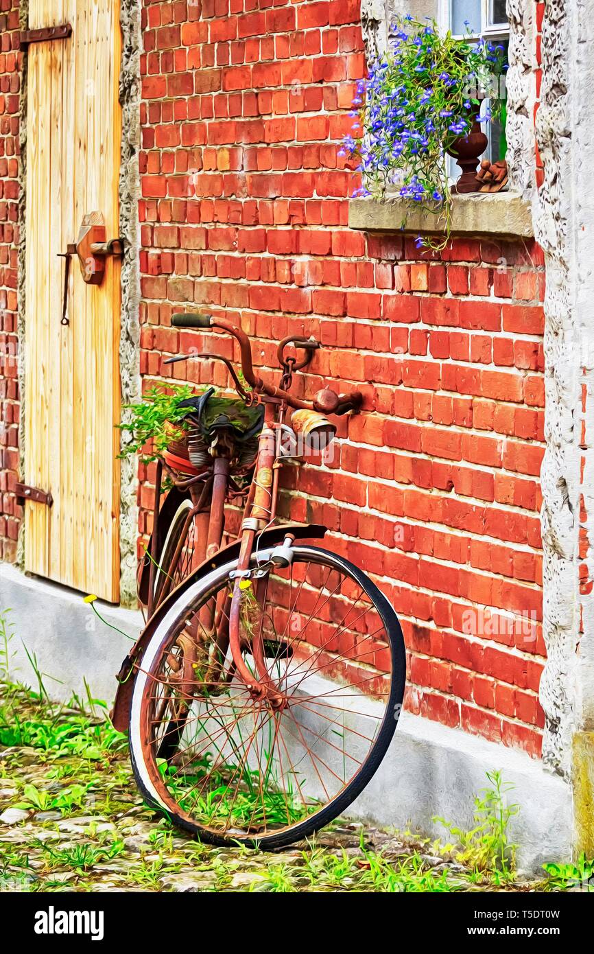 Rusty bicycle leaning against red brick facade, Fischerhude, Ottersberg, Lower Saxony, Germany Stock Photo