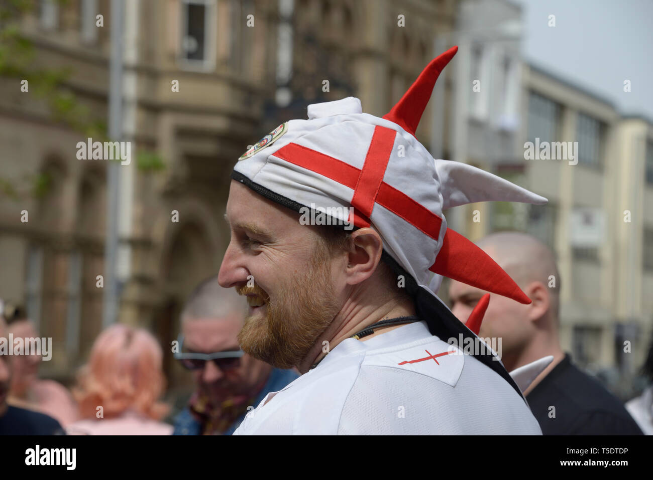 Man with Red & white headgear, at St. George's Day celebration, Nottingham, England. Stock Photo