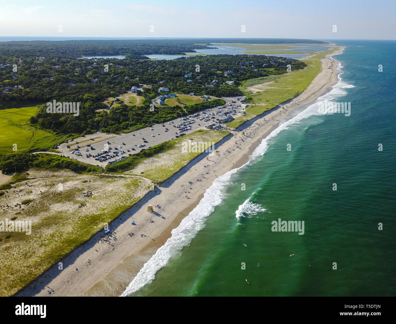 The cold waters of the Atlantic Ocean washes onto Nauset Beach in