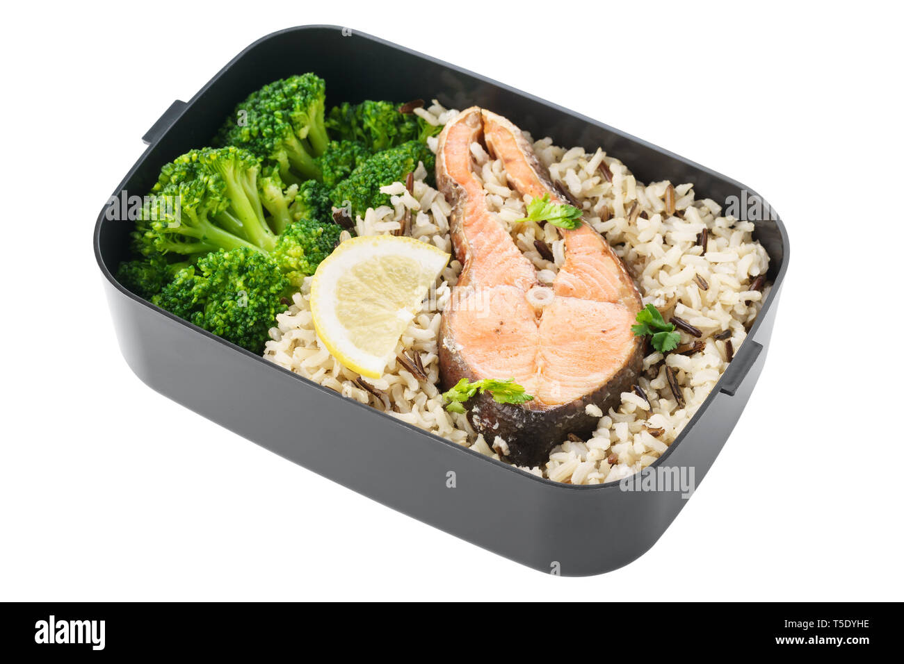 Healthy and nutritious lunch box with brown rice, broccoli and salmon ...