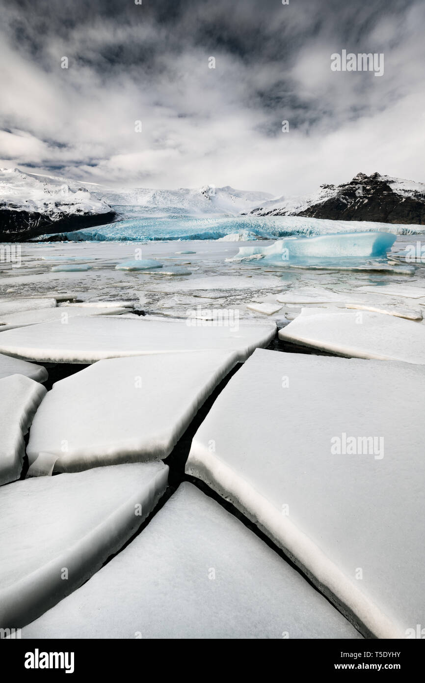 Breaking ice shelves at Fjallsarlon. Stock Photo