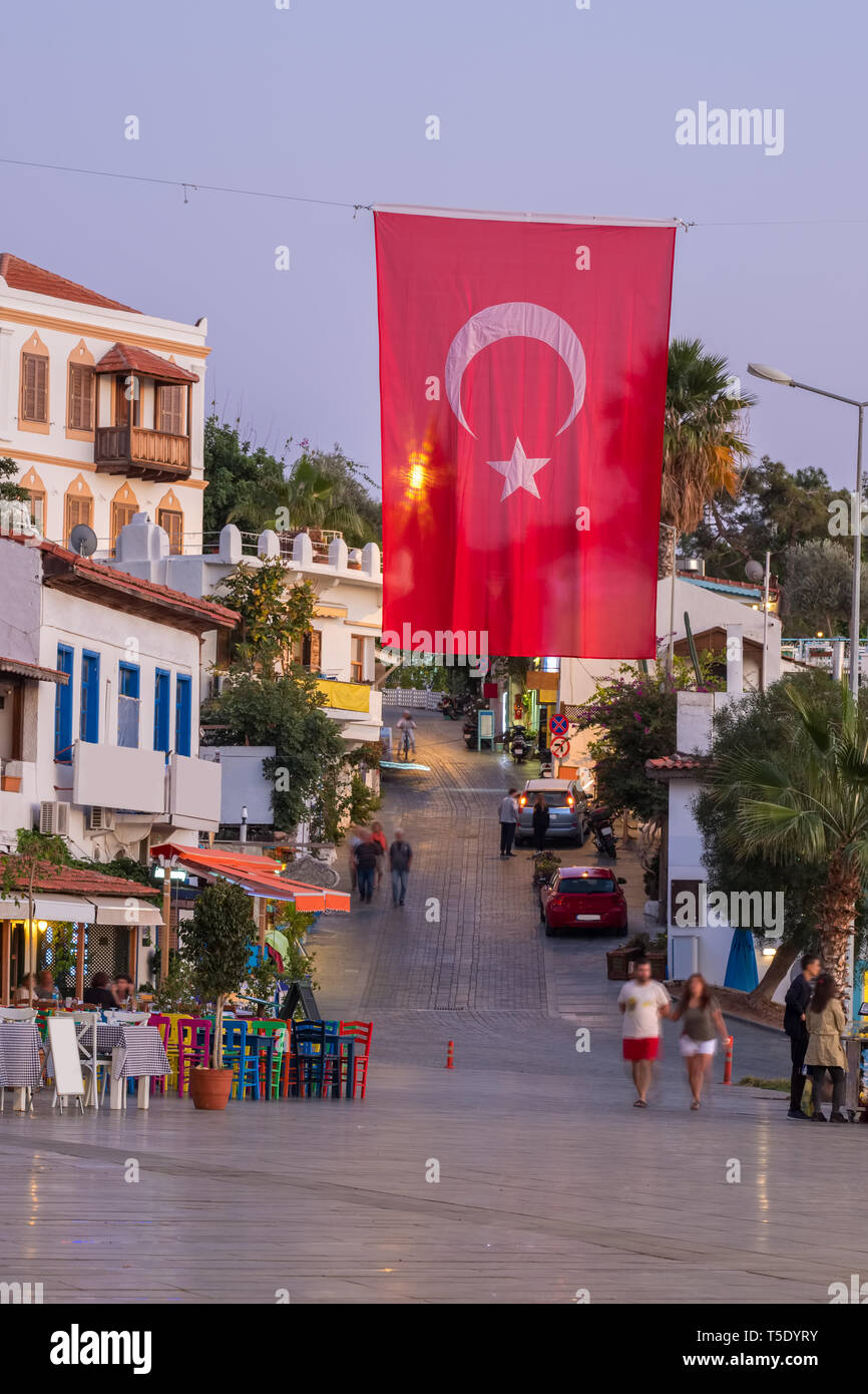 Turkish national flag on the main square in mediterranean town Kas in Turkey.  Stock Photo