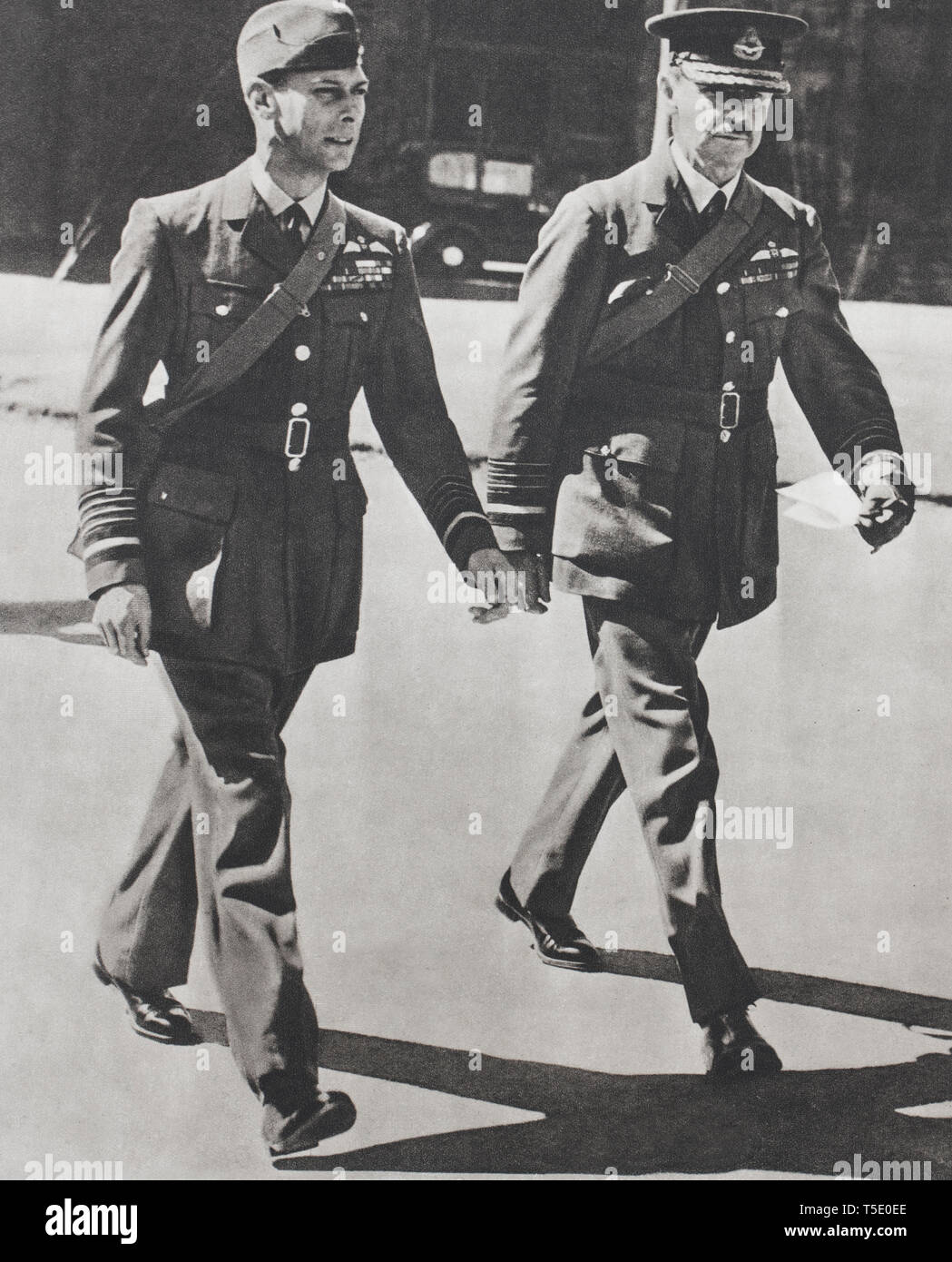 The king of England, in RAF uniform accompanied by Air Chief Marshal Sir Hugh Dowding, commander-in-chief of The Fighter Command, King George VI went  Stock Photo