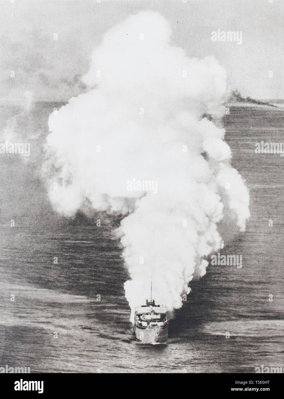 The R.A.F attacked the German convoys in the Mediterranean. A bomb dropped by a 'Beaufighter' aircraft hit an armed merchant ship carrying German rein Stock Photo