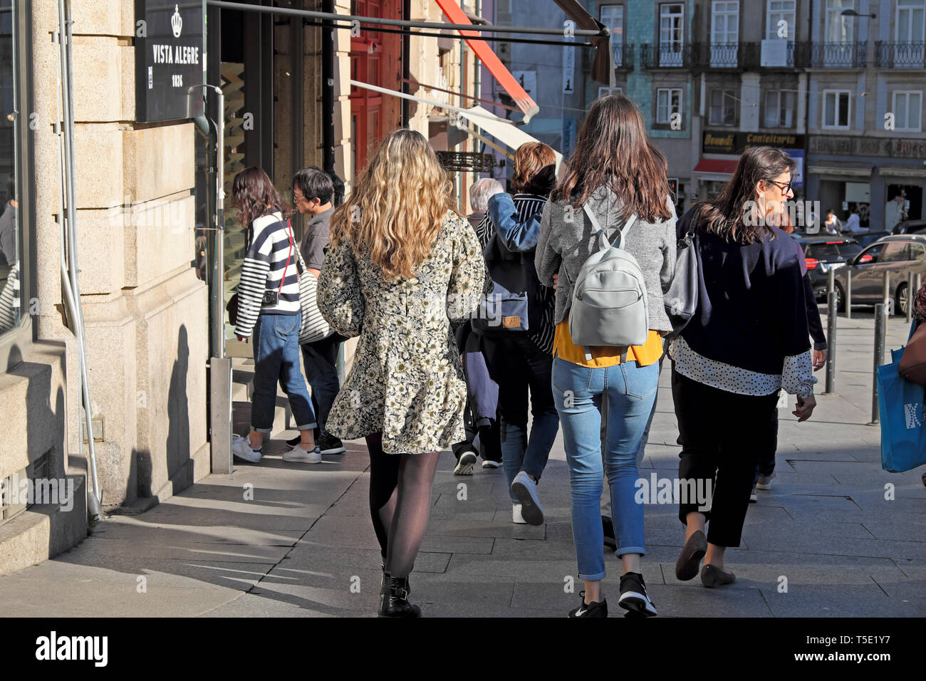 Women walking street rear view hi-res stock photography and images - Alamy