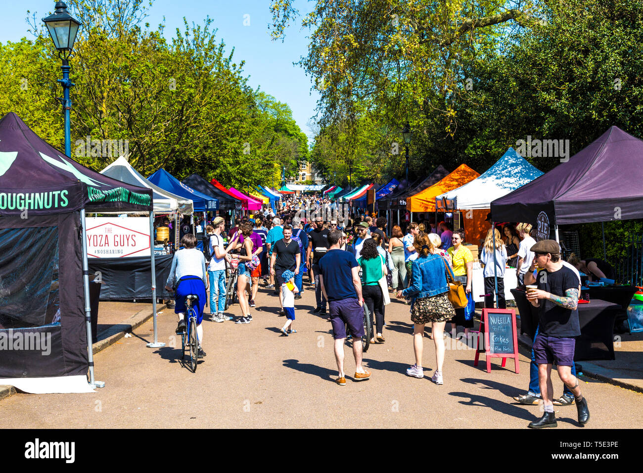21st April 2019 - people visiting stalls at the busy Victoria Park Market during Bank Holiday heatwave, London, UK Stock Photo
