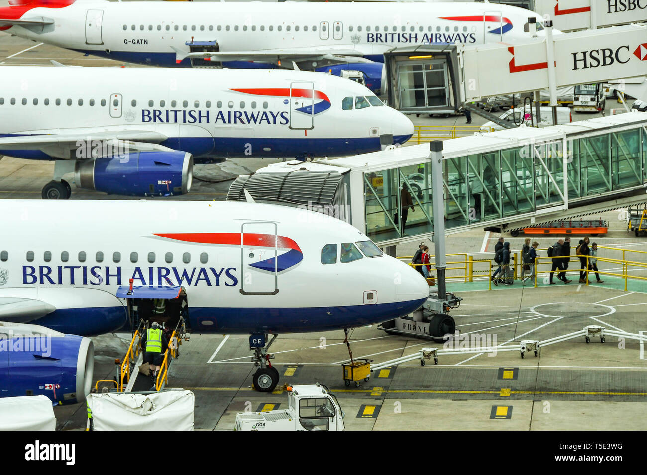 LONDON GATWICK AIRPORT, ENGLAND APRIL 2019 Passengers disembarking a