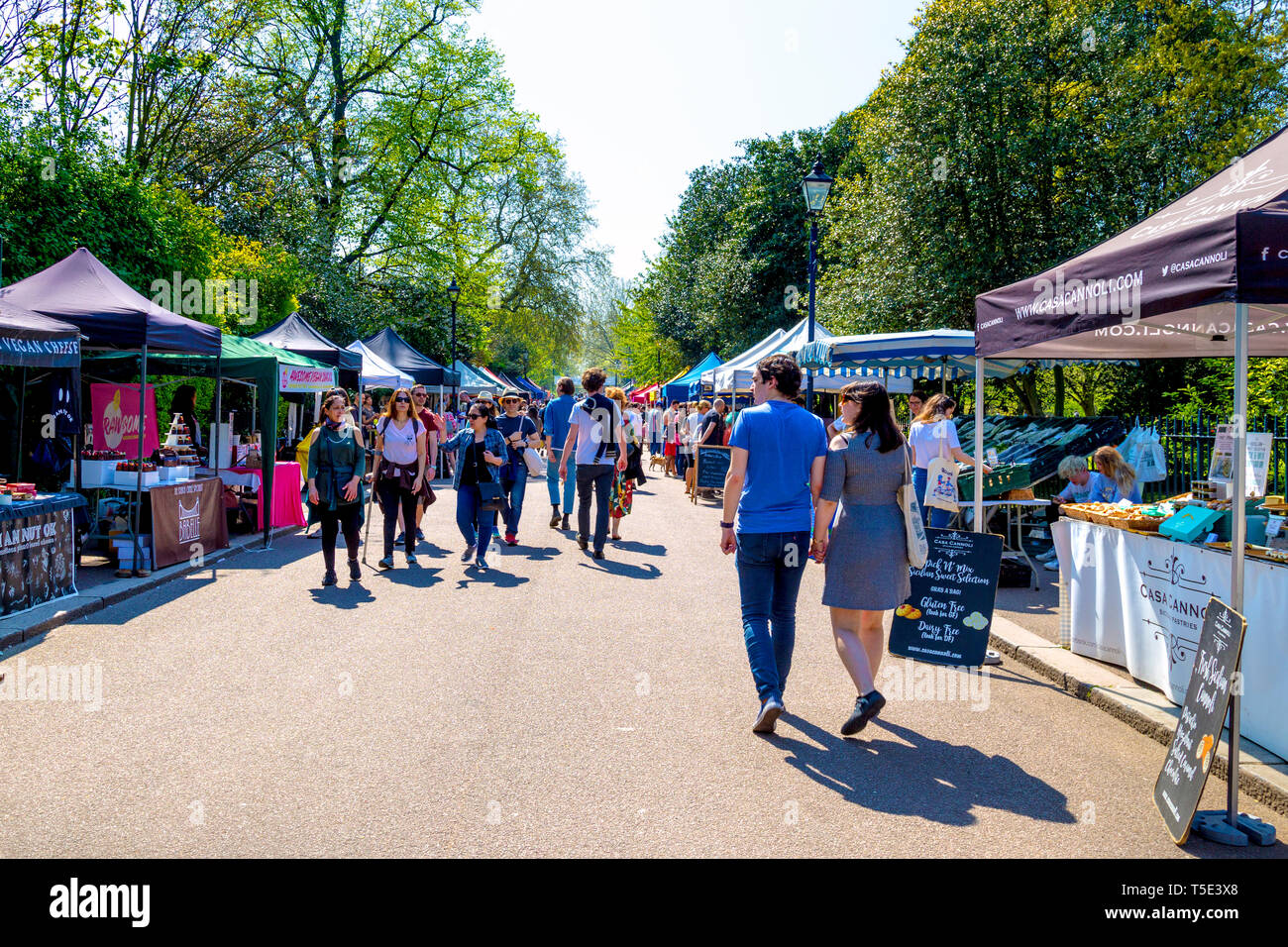 21st April 2019 - people visiting stalls at the busy Victoria Park Market during Bank Holiday heatwave, London, UK Stock Photo