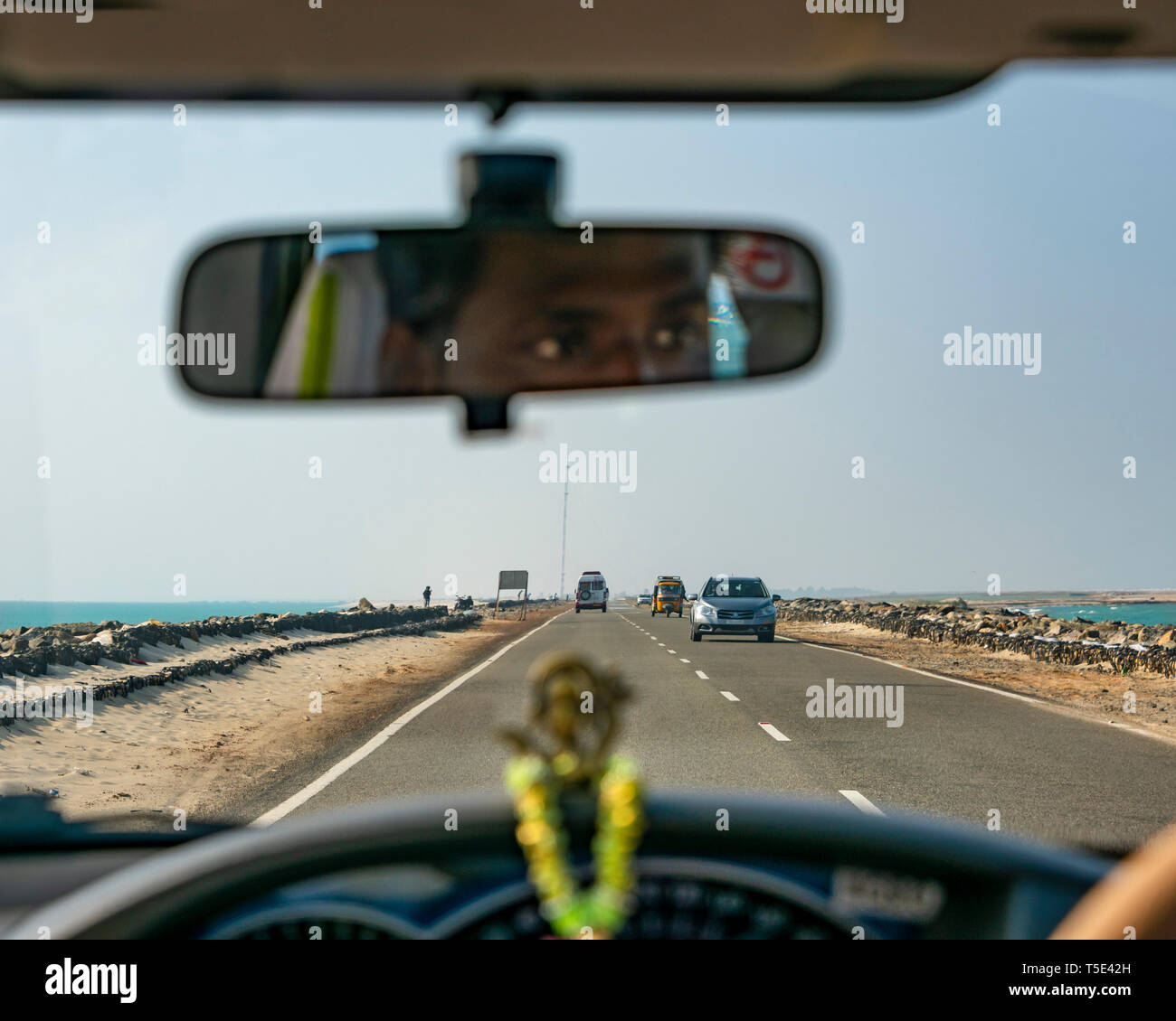 Horizontal passenger view from a car driving across the causeway between Dhanushkodi and Rameswaram, India. Stock Photo