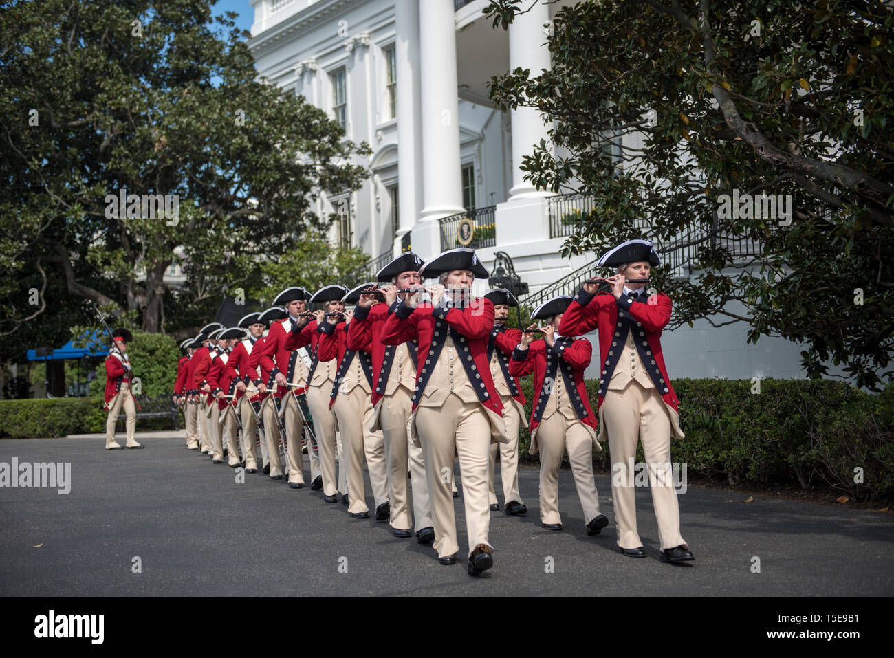 Soldiers with the 3d U.S. Infantry Regiment (The Old Guard) Fife and Drum Corps perform during the 141st White House Easter Egg Roll, April 22, 2019, Washington, D.C. Since 1878, Presidents and their families have celebrated Easter Monday by hosting an “egg roll” party, which is held on the South Lawn. The performance is one of the many community outreach activities the regiment conducts. (U.S. Army photos by Sgt. Nicholas T. Holmes) Stock Photo