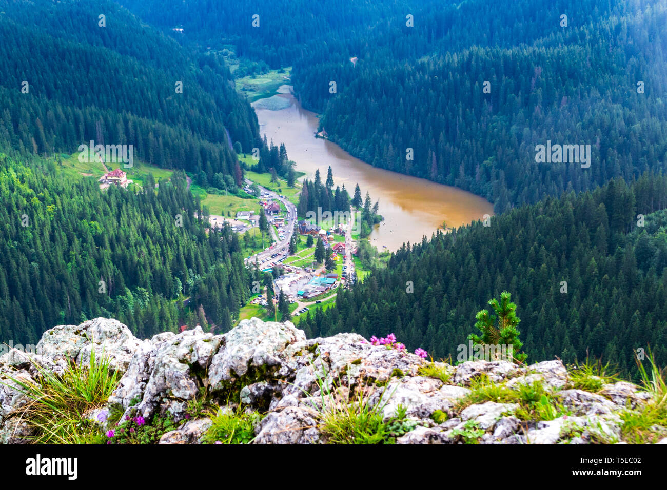 Red Lake (Lacu Rosu) in Bicaz Gorge (Cheile Bicazului), Neamt county, Romania, as seen from above, from the Suhardul Mic peak, at the end of the via f Stock Photo
