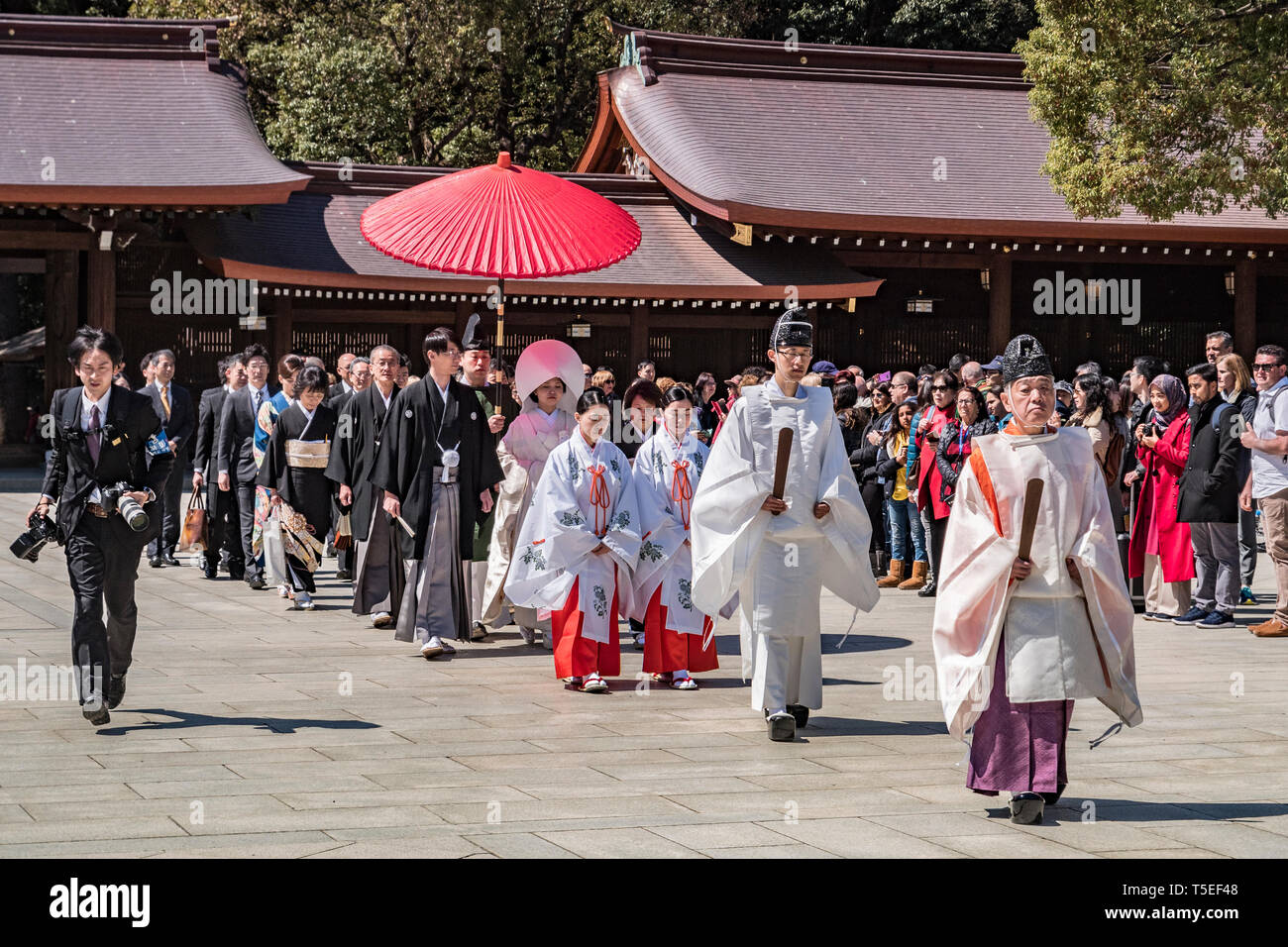 24 March 2019: Tokyo, Japan - Procession forming part of a traditional Shinto marriage ceremony at the Meiji Jingu shrine in Tokyo. Stock Photo
