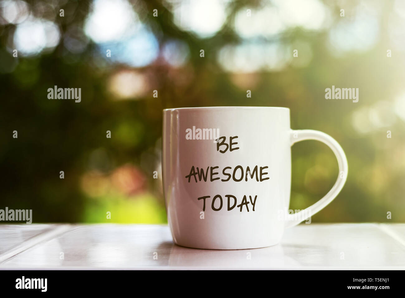 Inspirational quotes text on coffee mug - Be awesome today Stock Photo -  Alamy