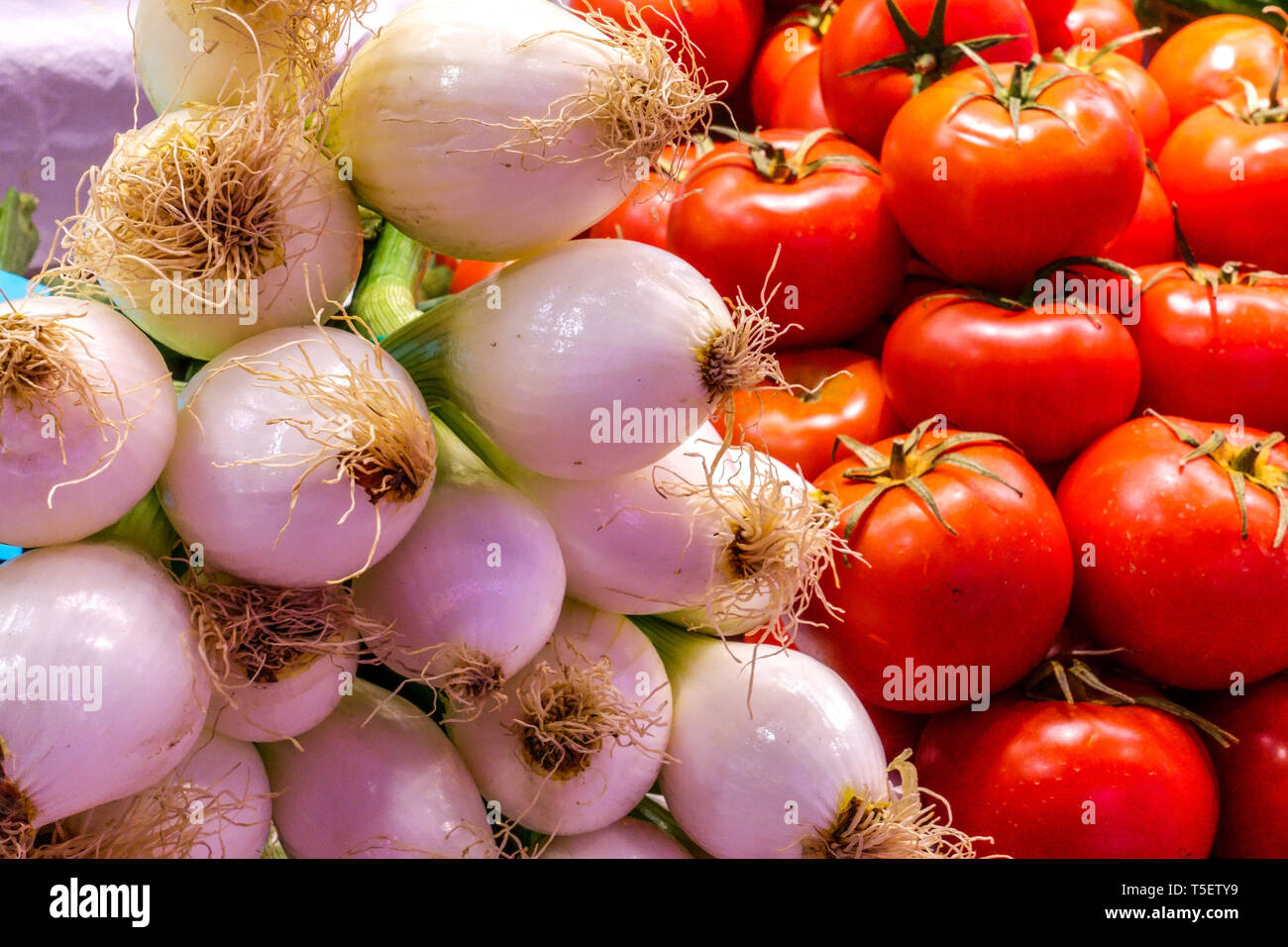 Fresh onions tomatoes on market, Spain Europe Stock Photo
