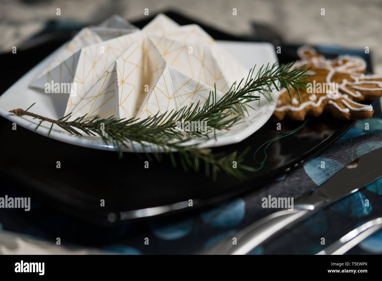 elegant table setting with decoration for dinner in regular home Stock Photo