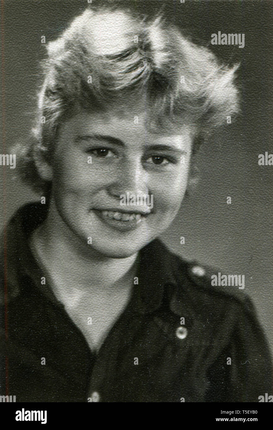 Portrait Of A Cheerful Girl With A Short Haircut Germany 1970s