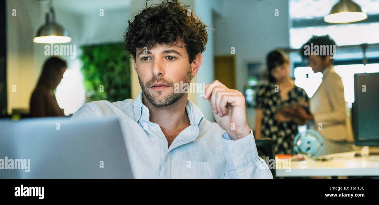 Businessman using laptop Stock Photo