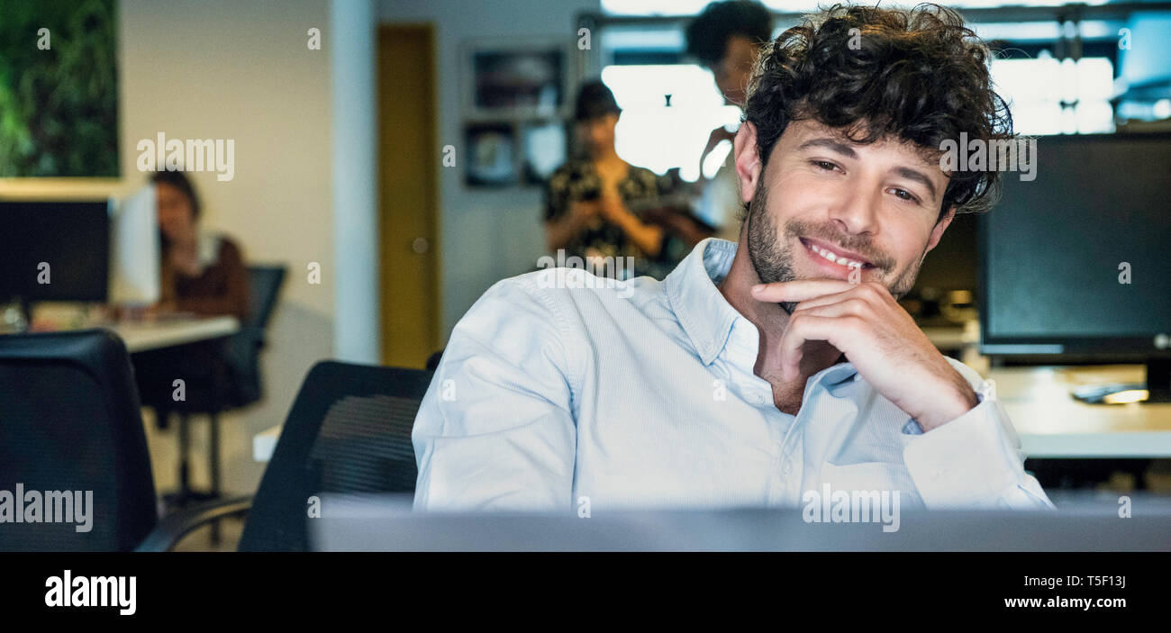 Businessman using laptop Stock Photo