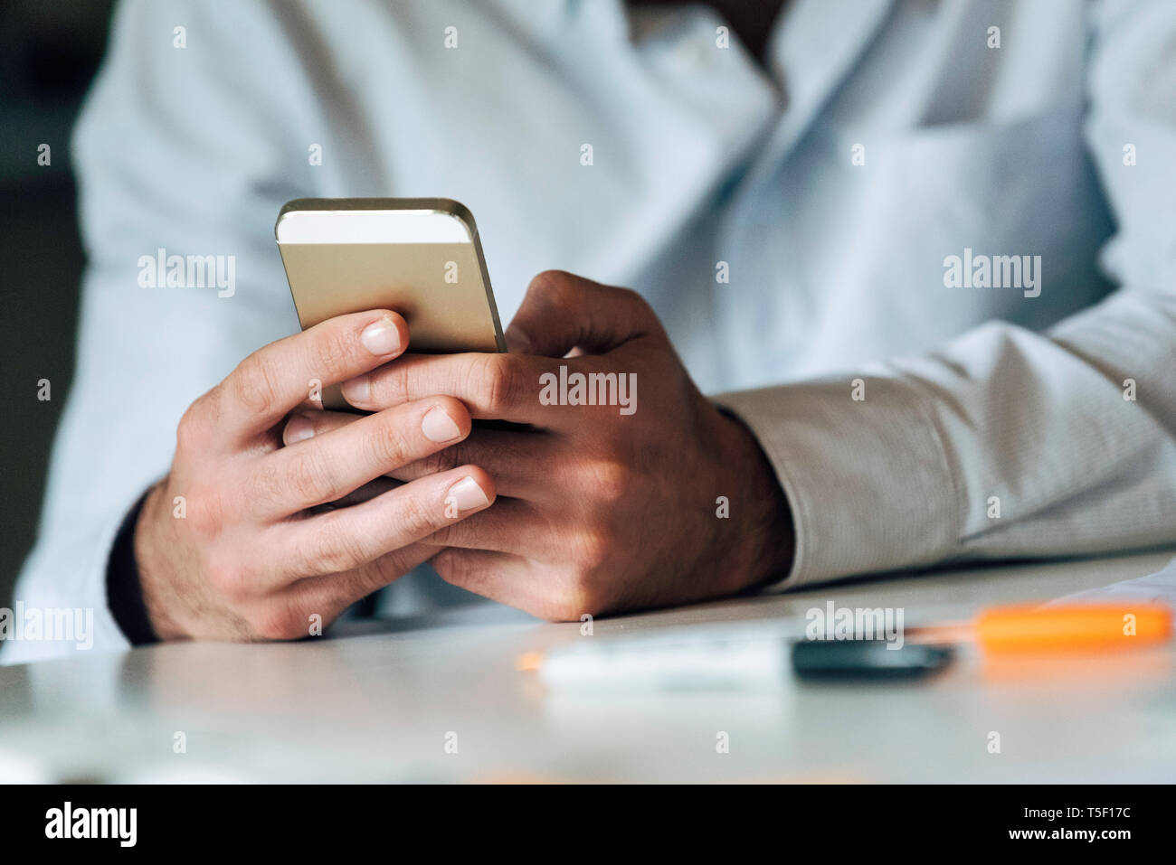 Businessman using smartphone Stock Photo