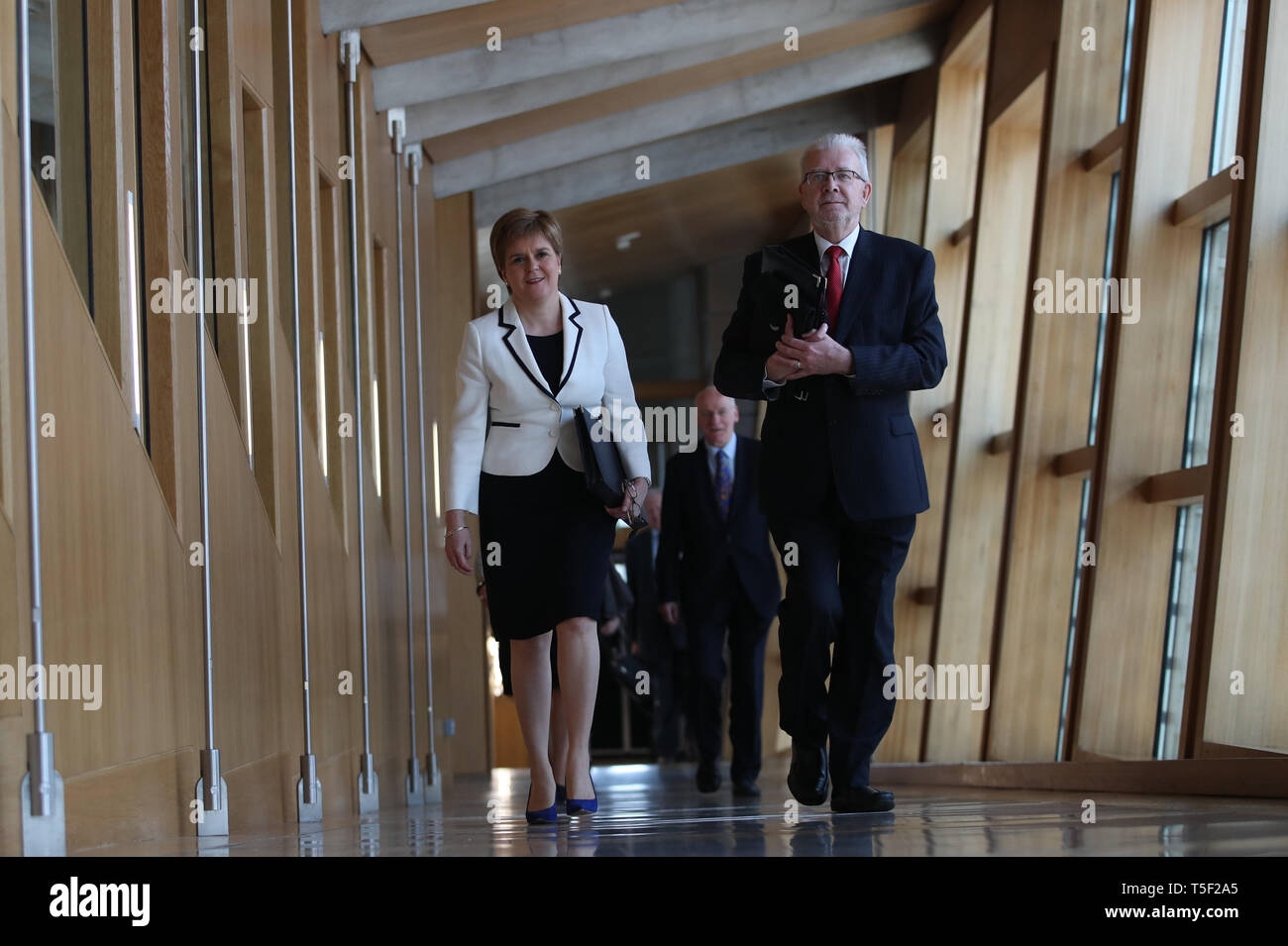 First Minister of Scotland Nicola Sturgeon and Brexit Minister Mike Russell arrive in the main chamber at the Scottish Parliament, Edinburgh ahead of a statement on Brexit and independence. Stock Photo