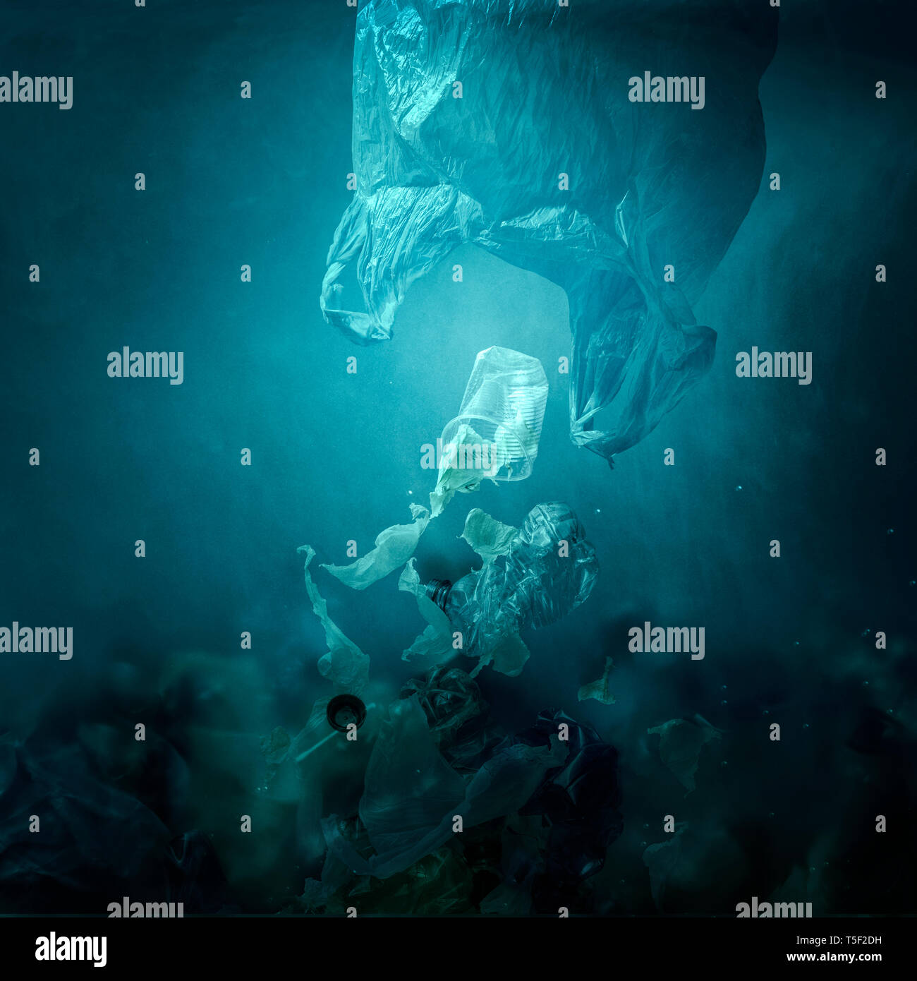 Plastic bag floating underwater and dispersing waste, ocean pollution ...