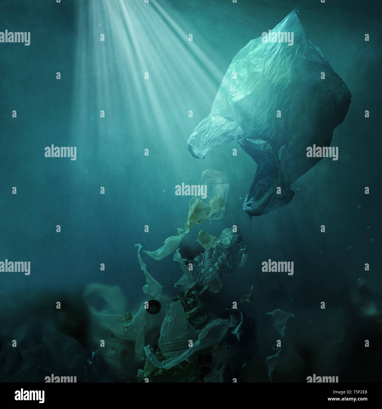 Plastic bag floating underwater and dispersing waste, ocean pollution ...