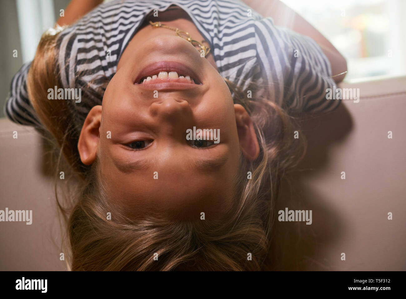 Preteen girl on sofa hi-res stock photography and images - Alamy