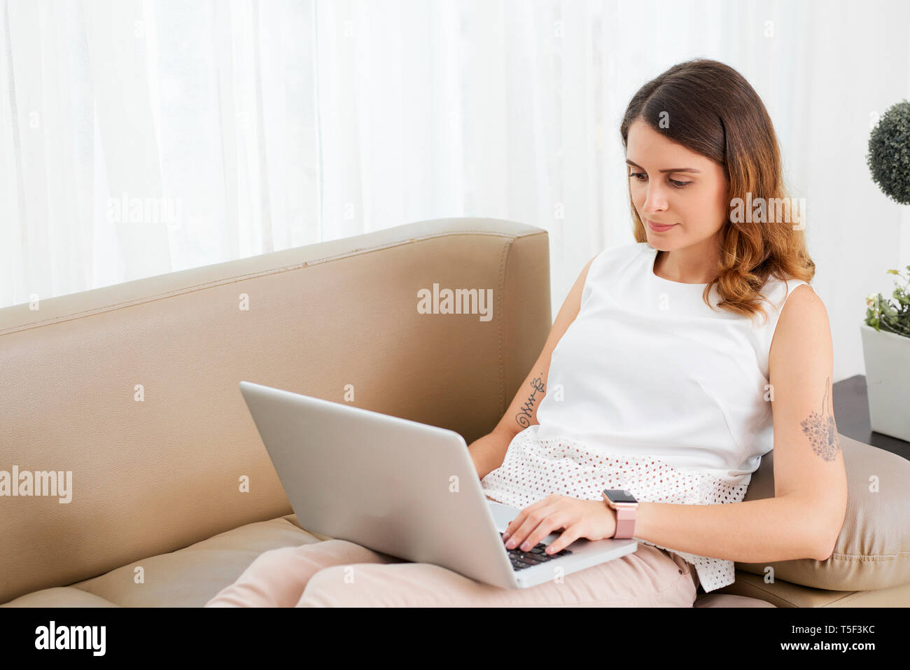 Woman working from home Stock Photo
