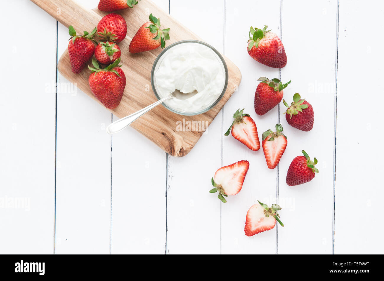 strawberries on a white wooden table Stock Photo