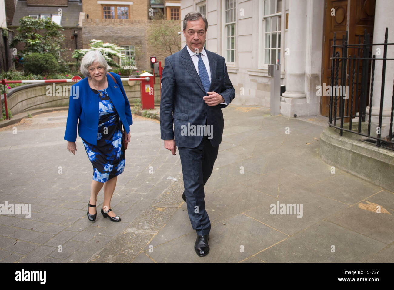 Leader of the Brexit Party Nigel Farage with former Tory minister Ann Widdecombe, who has defected from the Conservatives to join the Brexit Party, in Westminster, London. Stock Photo