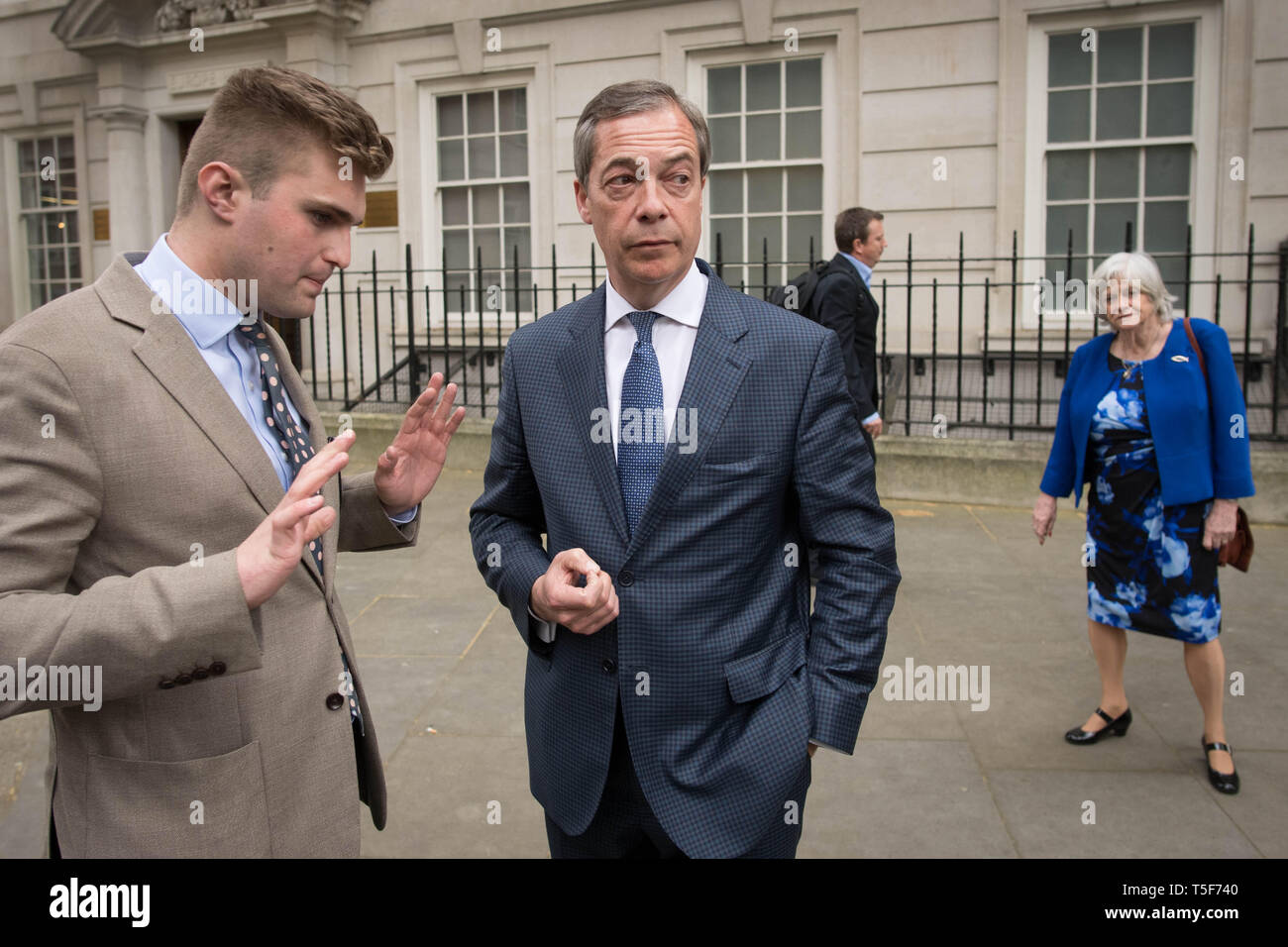 Leader of the Brexit Party Nigel Farage (centre) with former Tory minister Ann Widdecombe right) , who has defected from the Conservatives to join the Brexit Party, in Westminster, London. Stock Photo