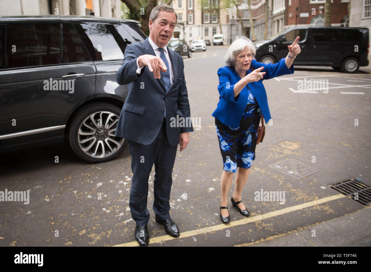 Leader of the Brexit Party Nigel Farage with former Tory minister Ann Widdecombe, who has defected from the Conservatives to join the Brexit Party, in Westminster, London. Stock Photo