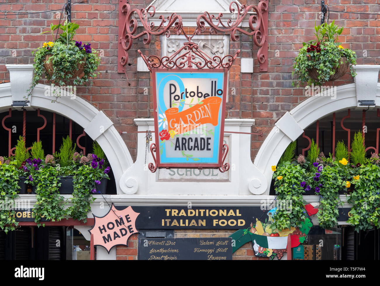 Portobello garden arcade exterior. Italian Restaurant in Portobello Road, Notting Hill, London, England Stock Photo