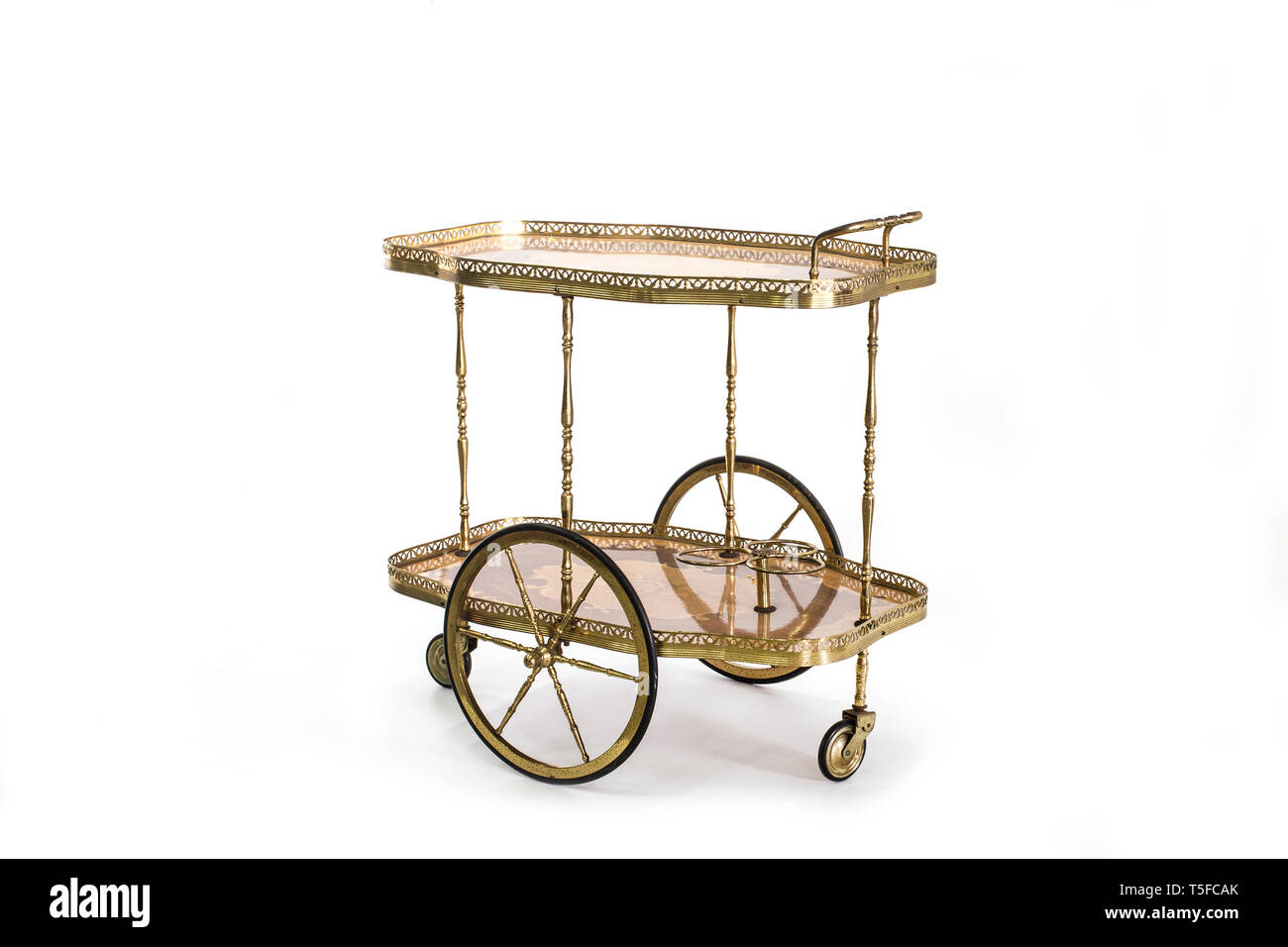 Antique serving table on wheels, decorated with galleries Stock Photo
