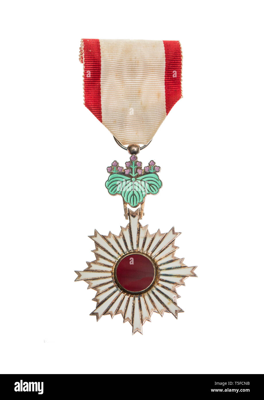 WWII Japanese Military order of the sacred treasure 4th class. The Order of the Sacred Treasure  is a Japanese order, established on 4 January 1888 by Stock Photo