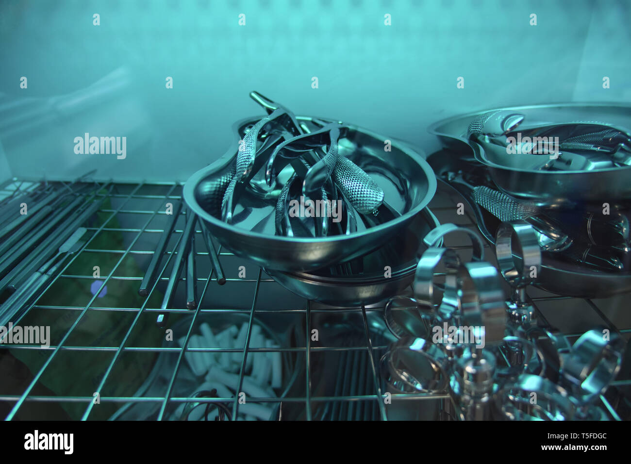 Disinfection of instruments in the machine in the dental clinic. Tools for dental treatment