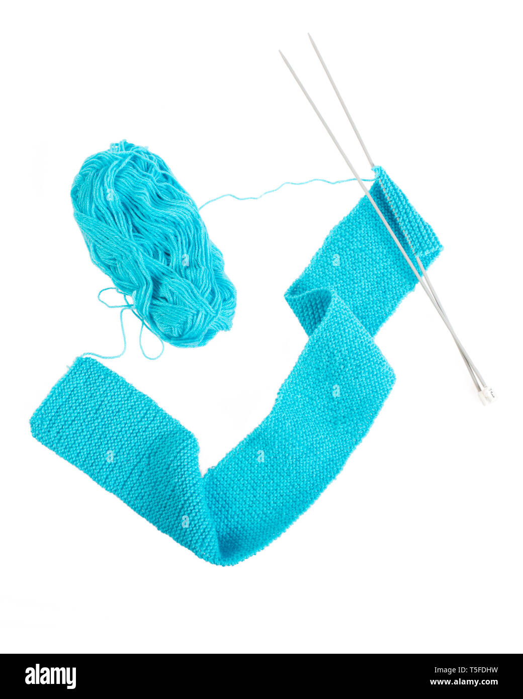 ball of yarn with knitting needles