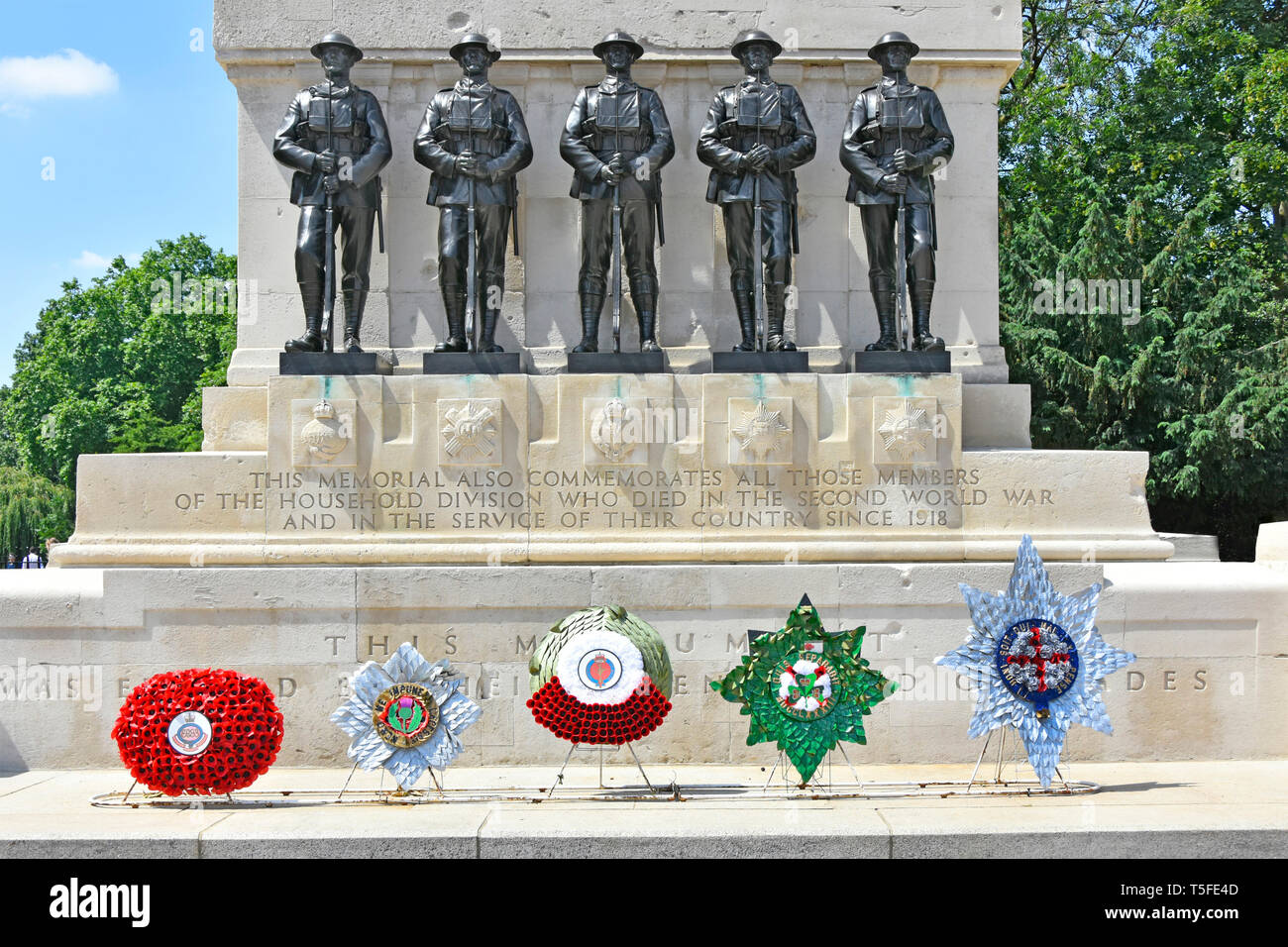 Guards war memorial first & second world war with five wreath & bronze sculpture of each foot guards regiment City of Westminster London England UK Stock Photo