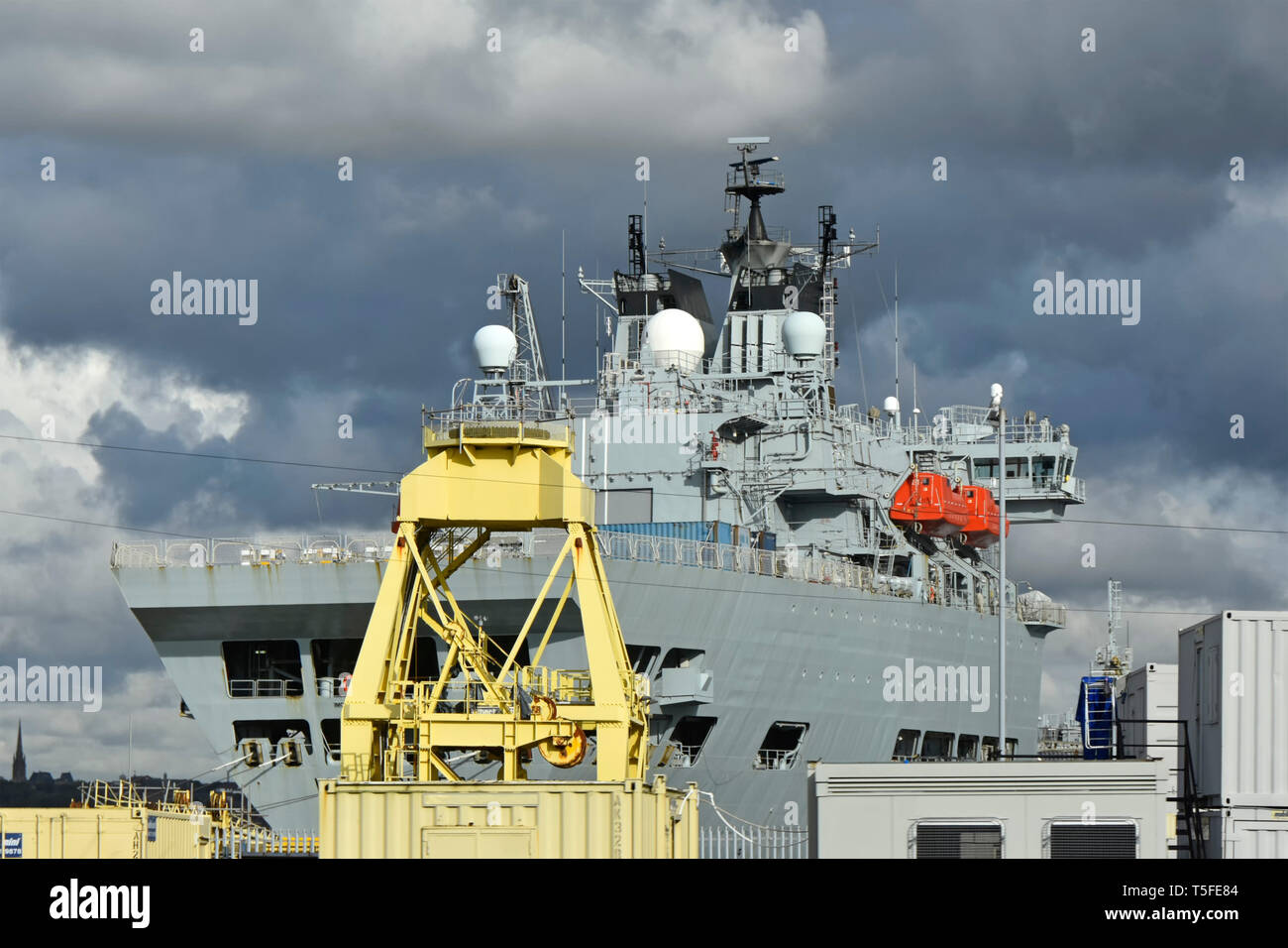Sunshine & dark storm clouds Royal Fleet Auxilary oil tanker ship A390
