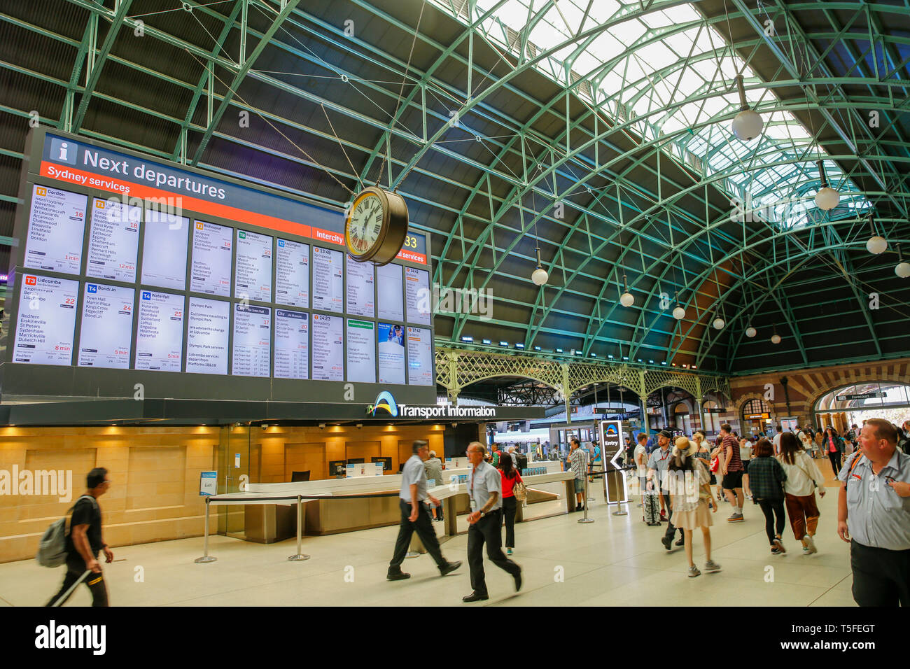 Interior of Central railway station in Sydney, with transport information board and customer help services,Sydney,Australia Stock Photo