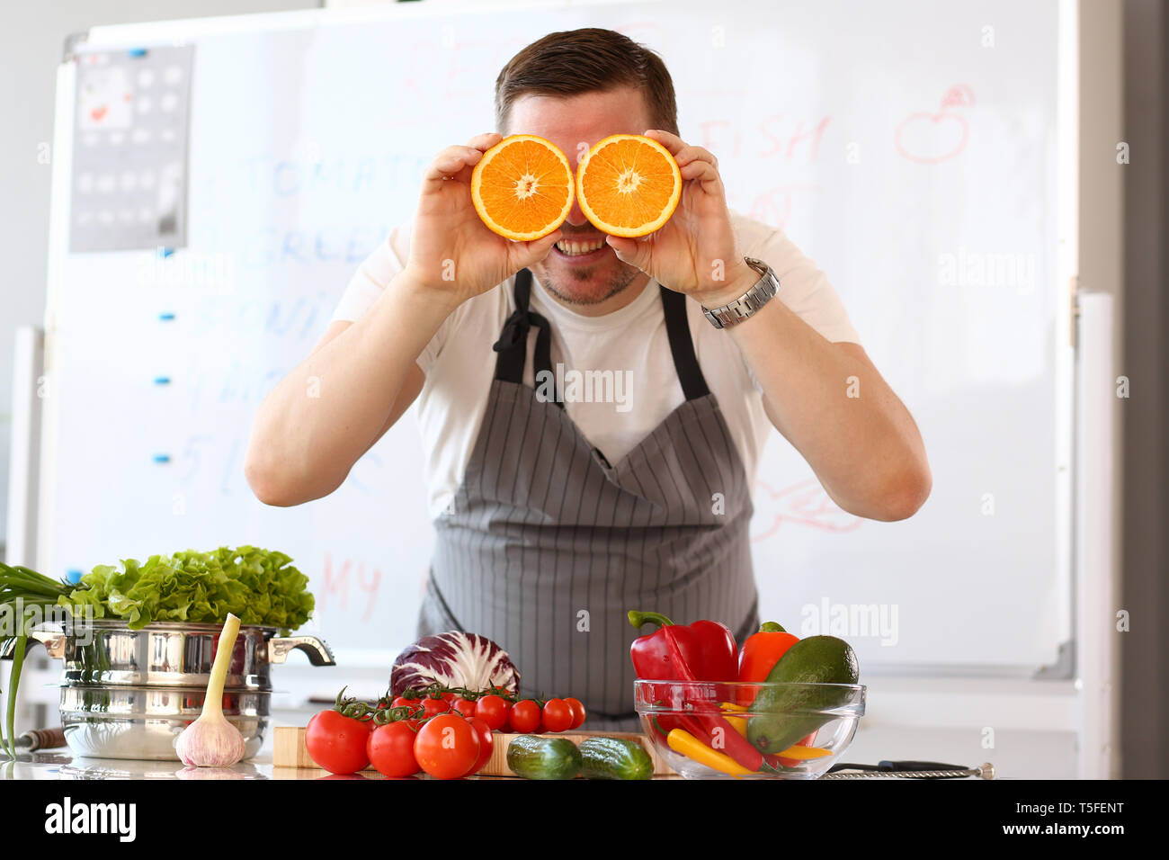 Chef Vlogger Showing Comic Orange Citrus Eye Stock Photo