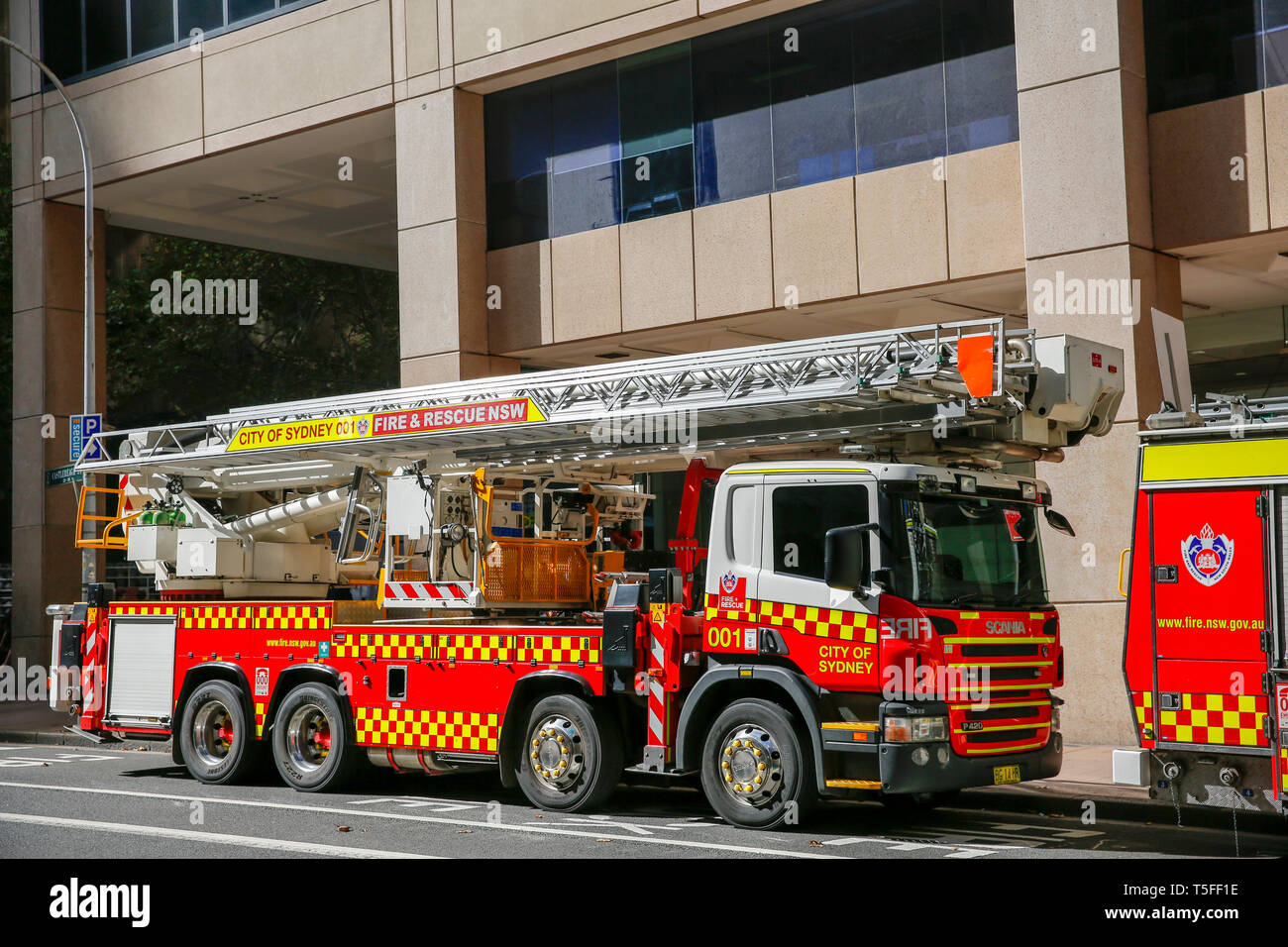 NSW City of Sydney fire brigade truck engine parked in Sydney city centre,Australia Stock Photo