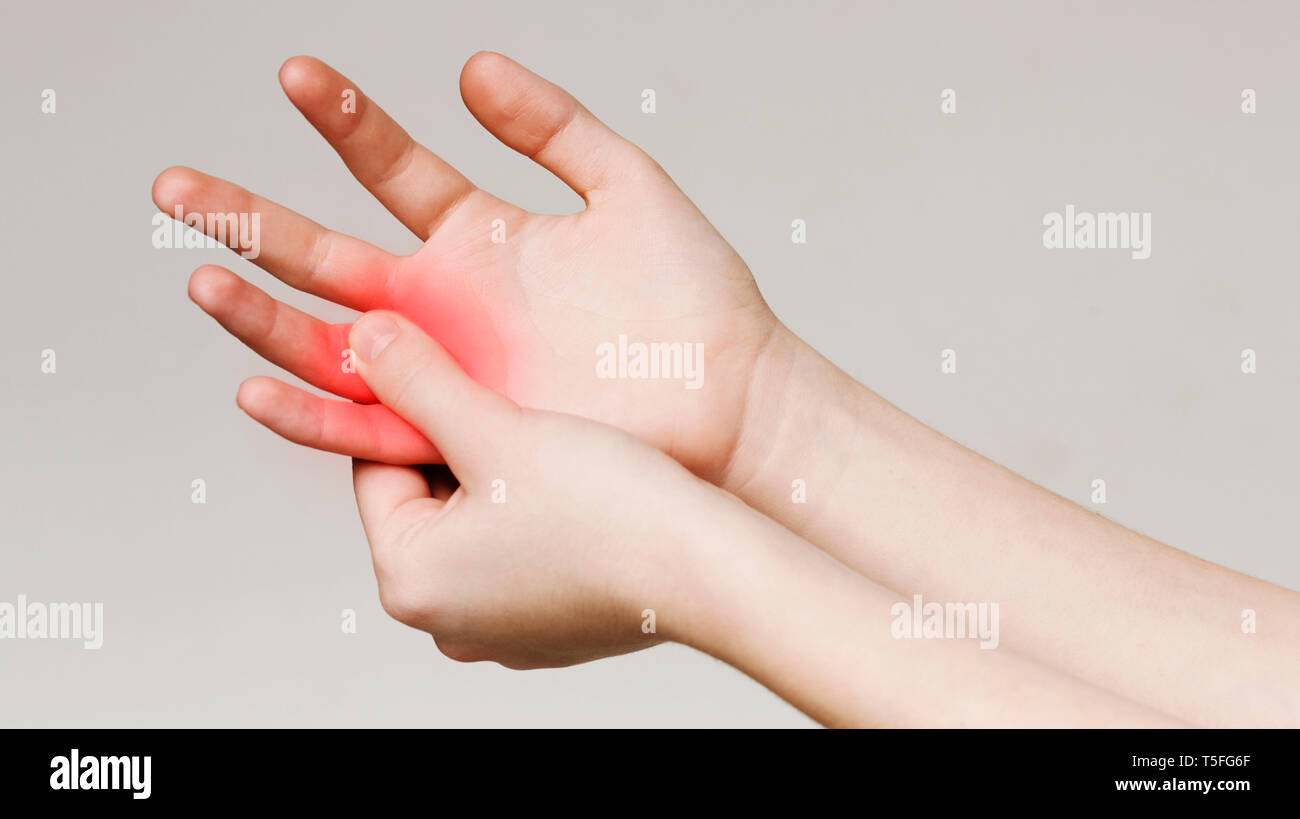 Pain and numbness in fingertips and palms Stock Photo