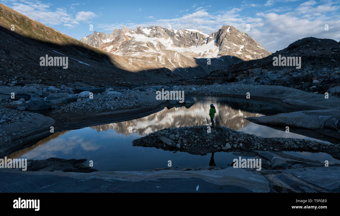 Greenland, Sermersooq, Kulusuk, Schweizerland Alps, mountains reflecting in water Stock Photo