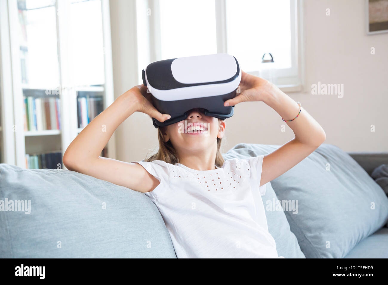 Girl using virtual reality glasses Stock Photo