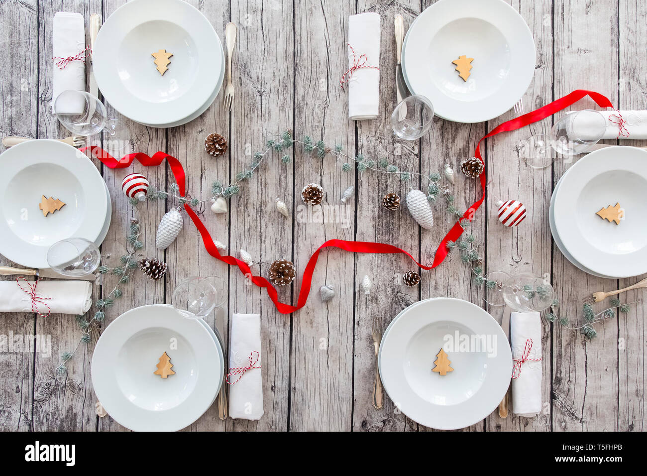 Laid table with Christmas decoration Stock Photo