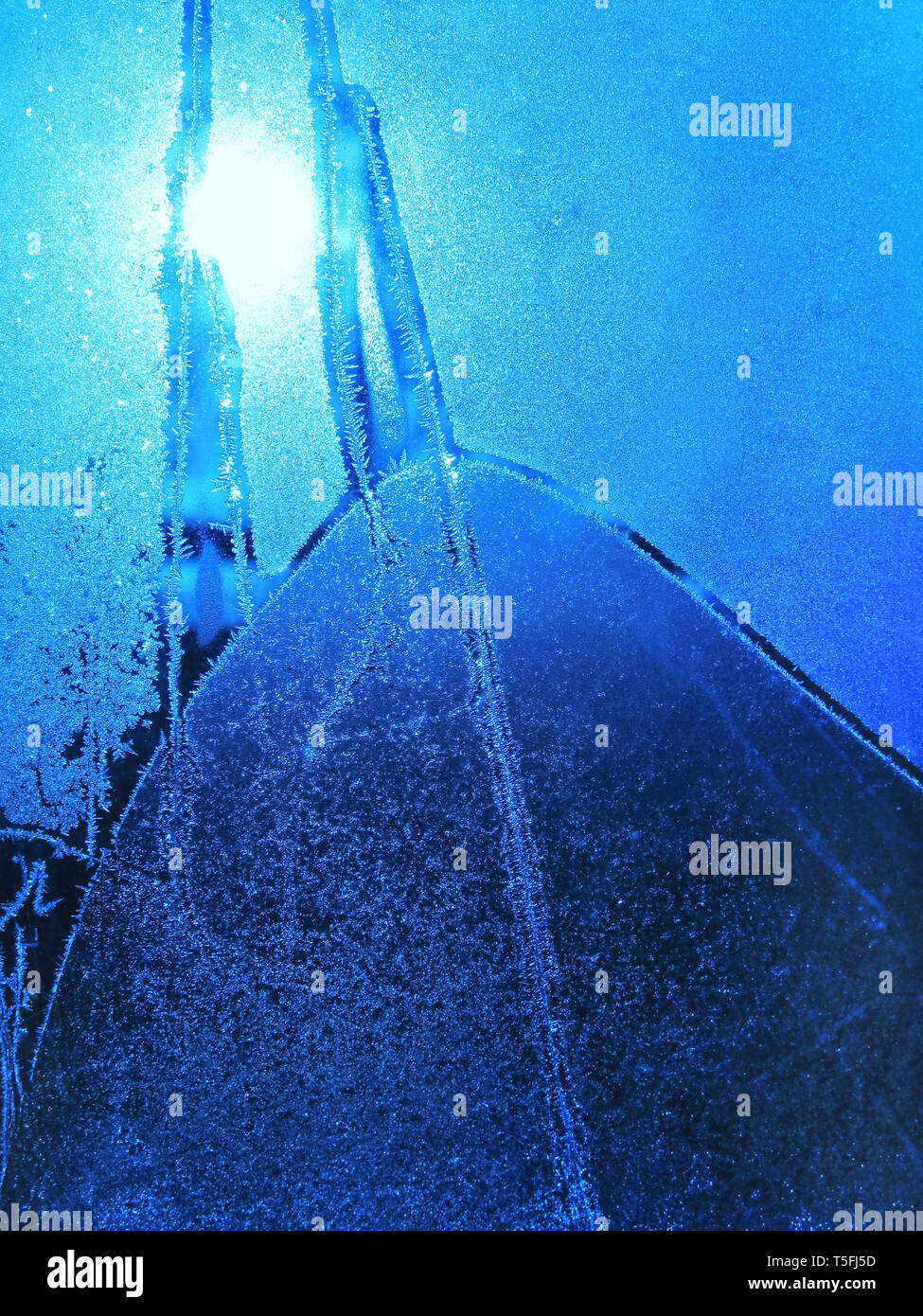 frosty natural pattern and sunlight on winter window Stock Photo - Alamy