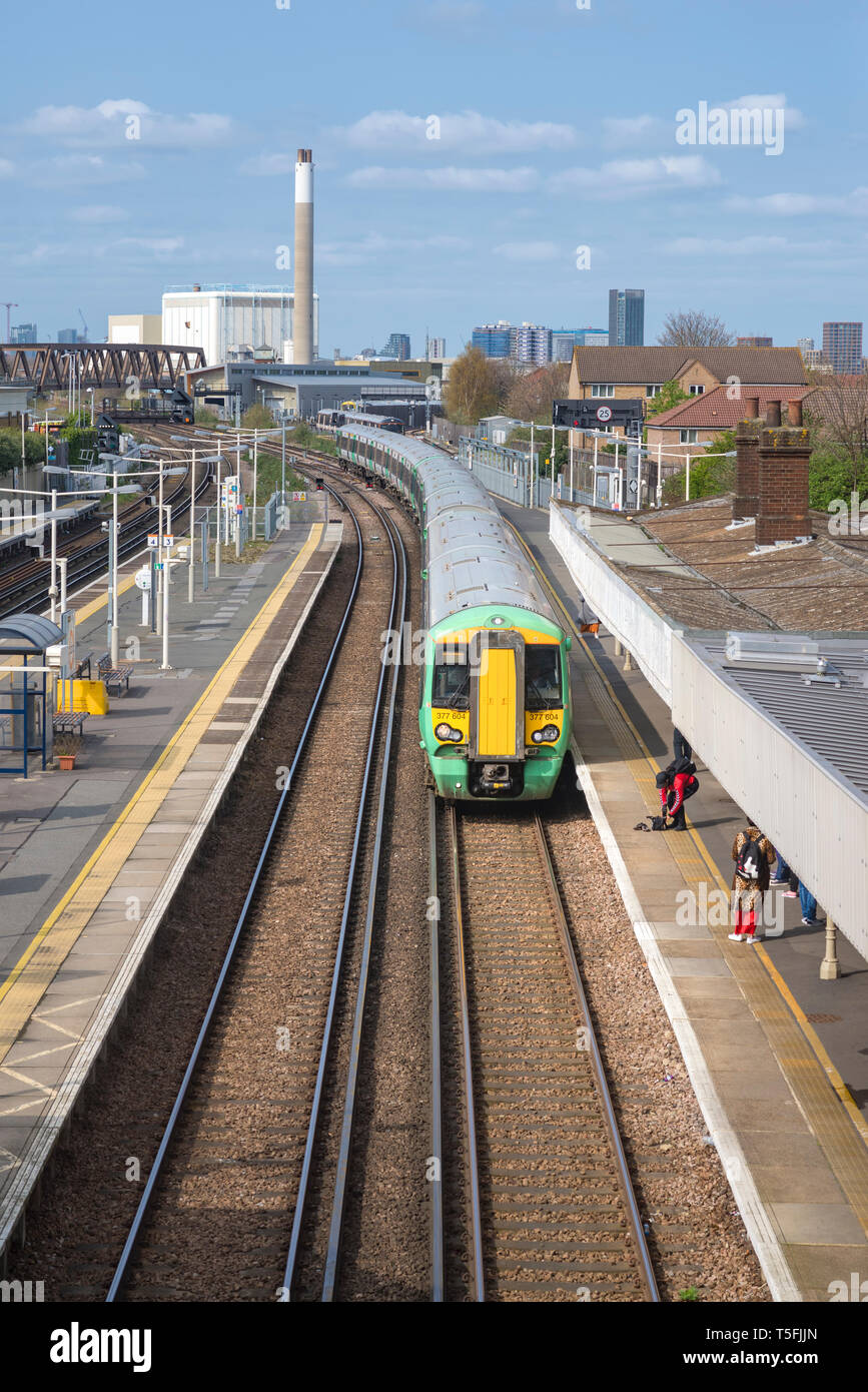 Passenger train at New Cross Gate station in London, England Stock