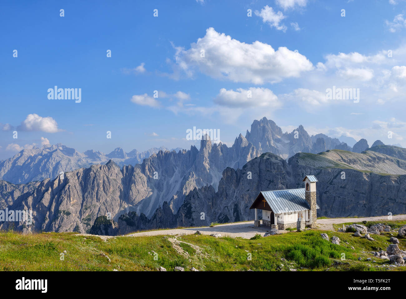 Alpine Chapel with Cadini di Misurina peaks in background Belluno Province, Veneto, Dolomites, Italy Stock Photo