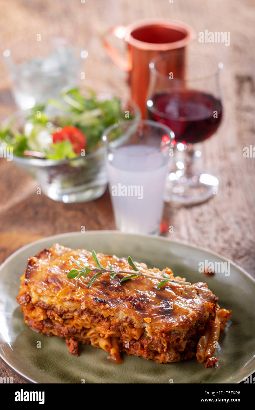 greek pastizio noodle dish with cheese Stock Photo - Alamy